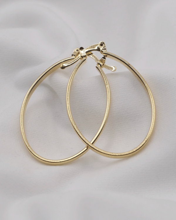 ARRACADA OVAL GRANDE ORO LAMINADO 18KT