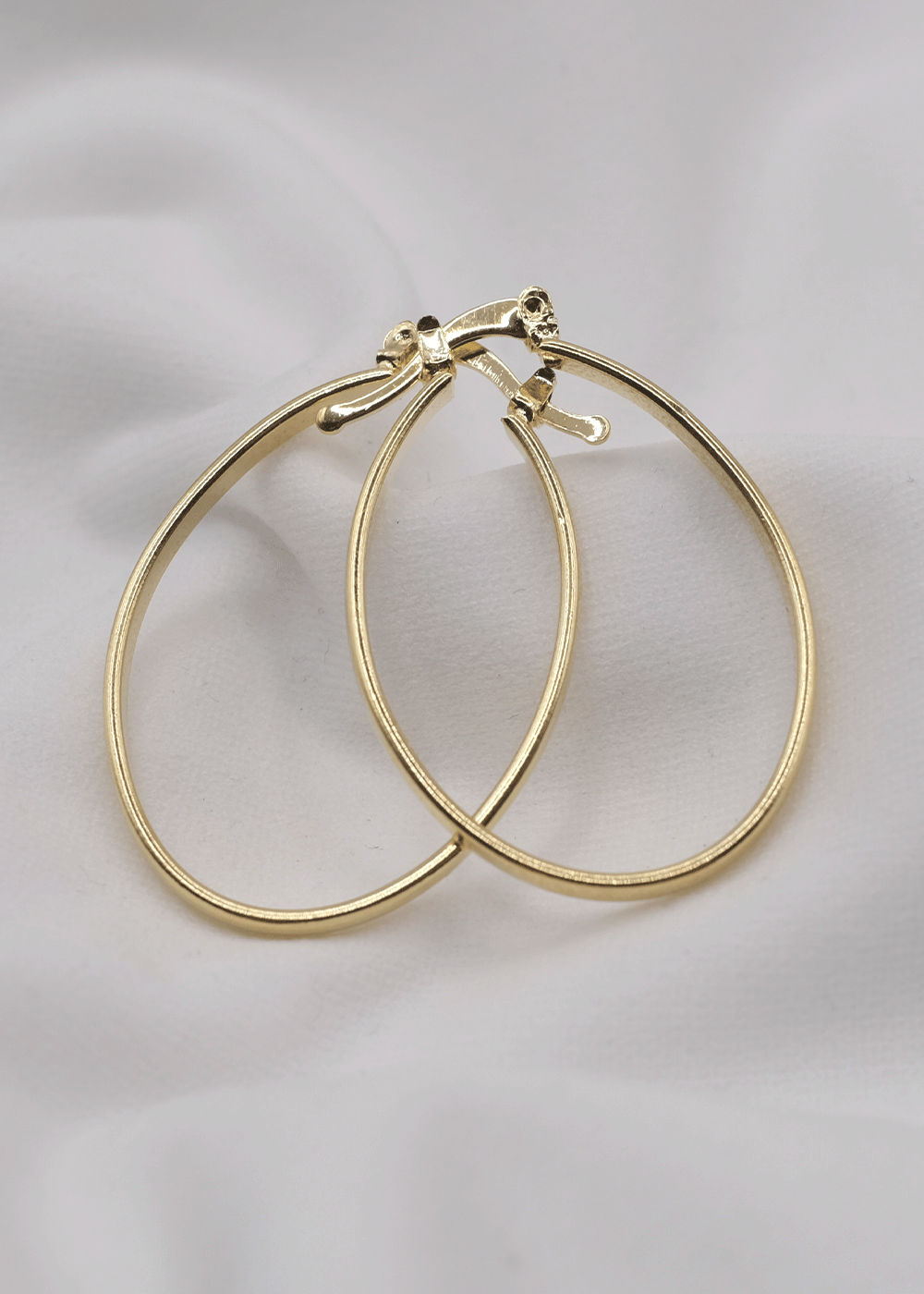 ARRACADA OVAL GRANDE ORO LAMINADO 18KT